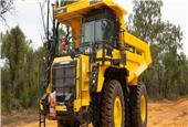 Komatsu adds low-emission engines to dump trucks