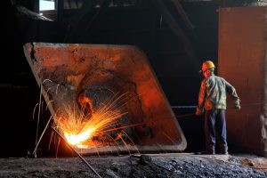 Iron ore price rises on firmer steel outlook, but trade tensions cap gains